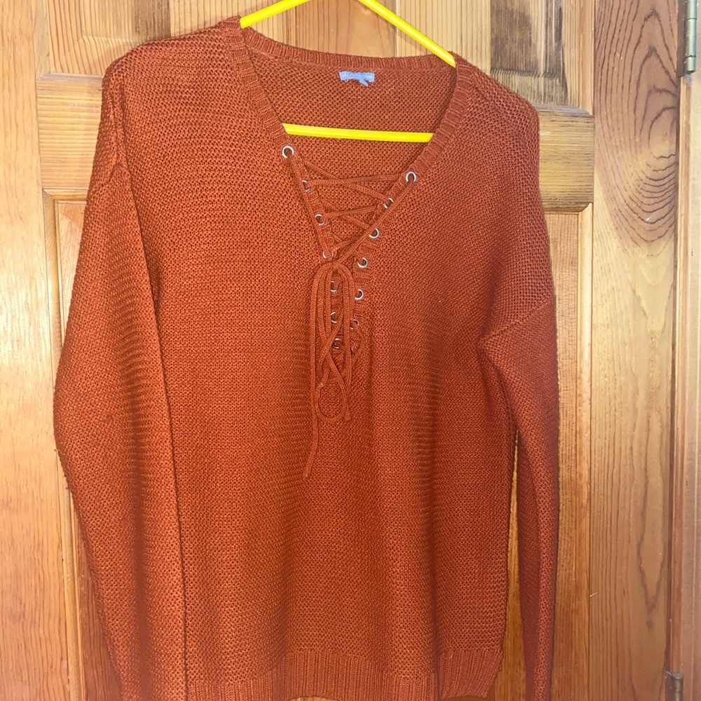 orange sweater